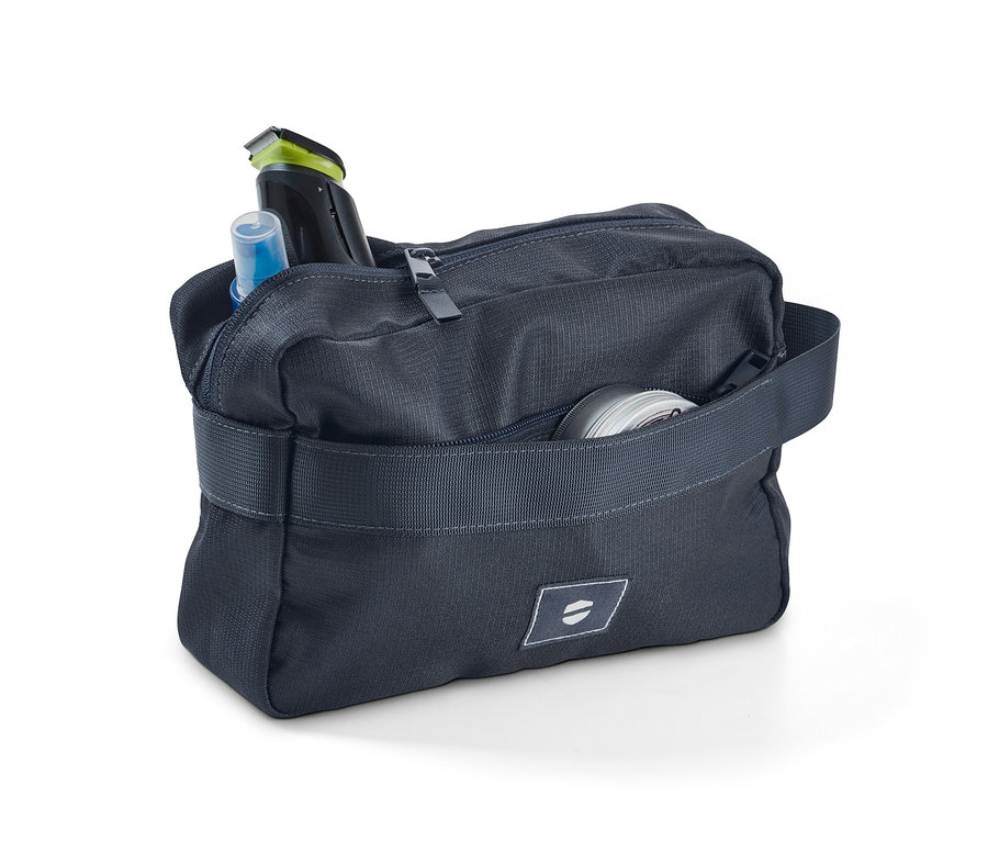 İçinde saklanan tuvalet malzemeleri olan açık Kişisel Bakım Çantası, Mavi.