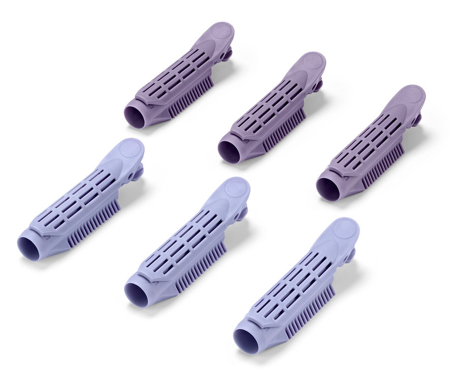 Beyaz bir arka plan üzerinde altı adet mor saç bigudisi.