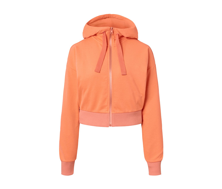 Ortada fermuarı olan turuncu, kısa spor sweatshirt.