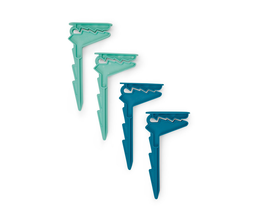 Dört adet havlu mandalı: iki açık yeşil ve iki koyu mavi.