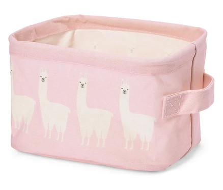 Beyaz lama desenli ve taşıma saplı pembe kumaş kutu.