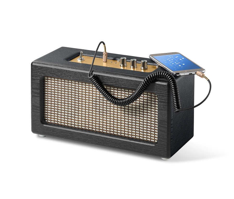 Retro Bluetooth® Hoparlör kabloyla telefona bağlı.