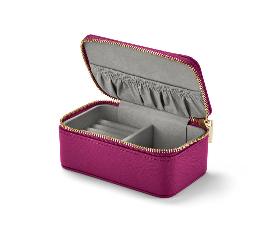 Altın fermuarlı ve gri iç kısma sahip, açık, mor renkli küçük takı kutusu.