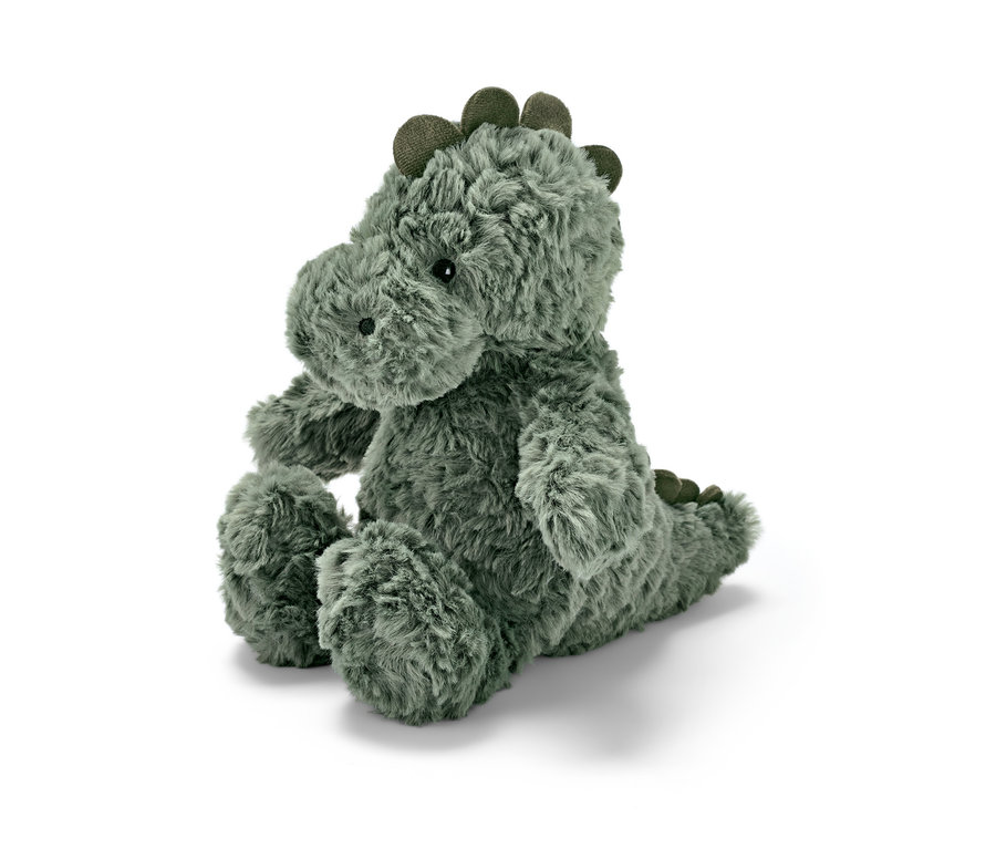 Pelüş Hayvan »Dinozor« beyaz bir arka plan üzerinde oturuyor.