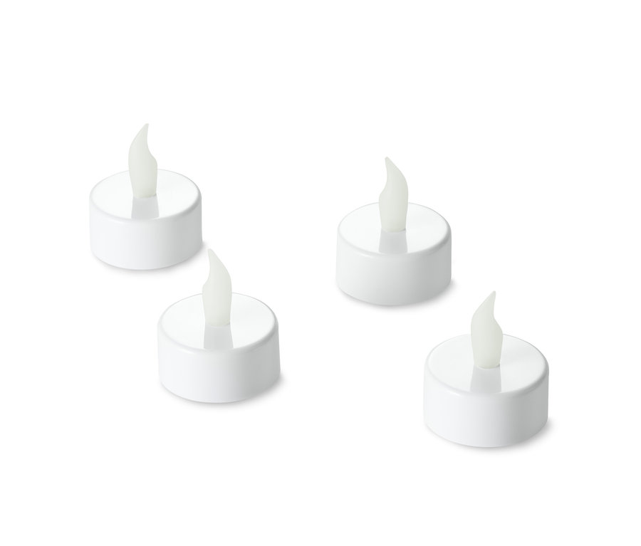 Beyaz bir arka plan üzerinde düzenlenmiş dört adet beyaz 4 Adet LED Tealight Mum, Beyaz.