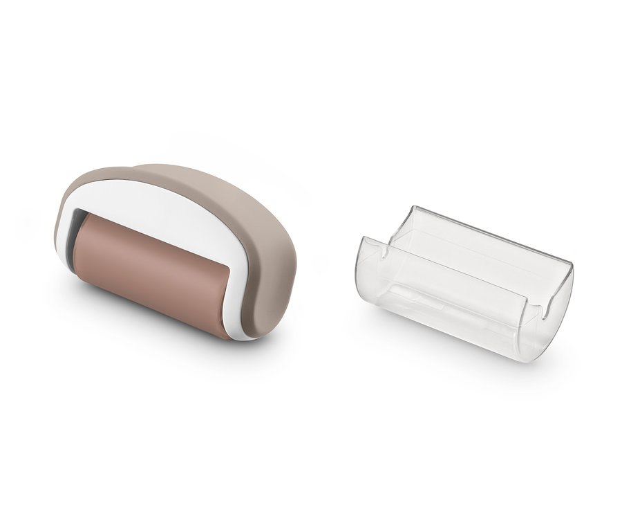 Bej rengi tüy toplama rulosu ve şeffaf kapağı.