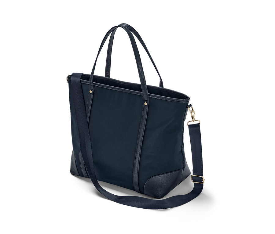 Sapları ve omuz askısı olan lacivert bir Shopper Çanta.