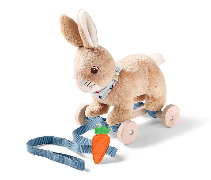 Tekerlekli Oyuncak »Zıplayan Tavşan« tasmasında turuncu havuç ile birlikte.