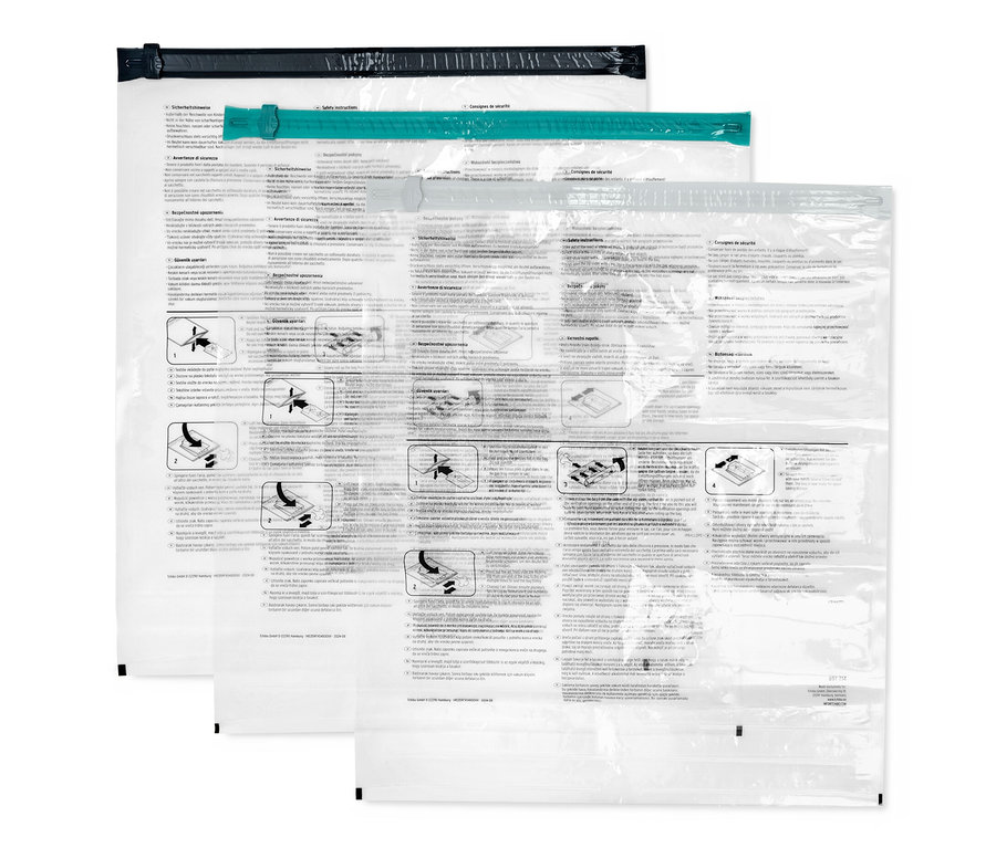 Üç adet vakumlu seyahat torbası