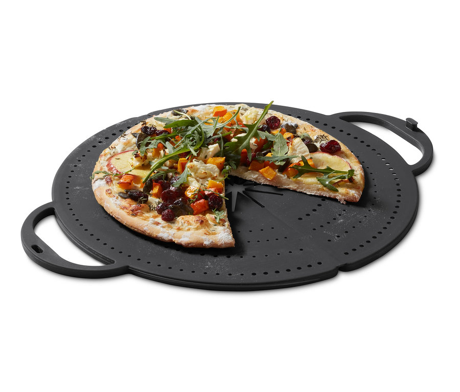 Pizza, Yağ Sıçratmaz üzerinde duruyor.