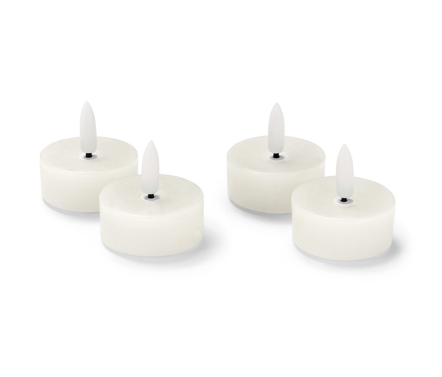 Dört adet krem rengi LED gerçek mum tealight.