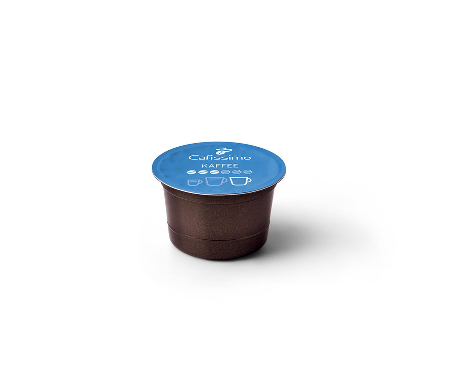 Beyaz bir arka plan üzerinde Coffee Fine Aroma Kapsül Filtre Kahve kapsülünün yakın çekimi.