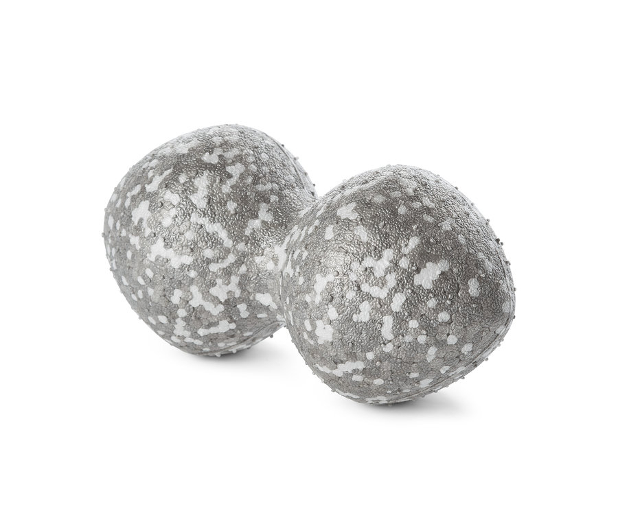 Beyaz bir arka planda iki adet gri İkili Bağ Doku Masaj Topu.