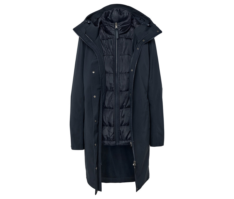Açık, lacivert kapüşonlu ve kapitone yelekli palto.