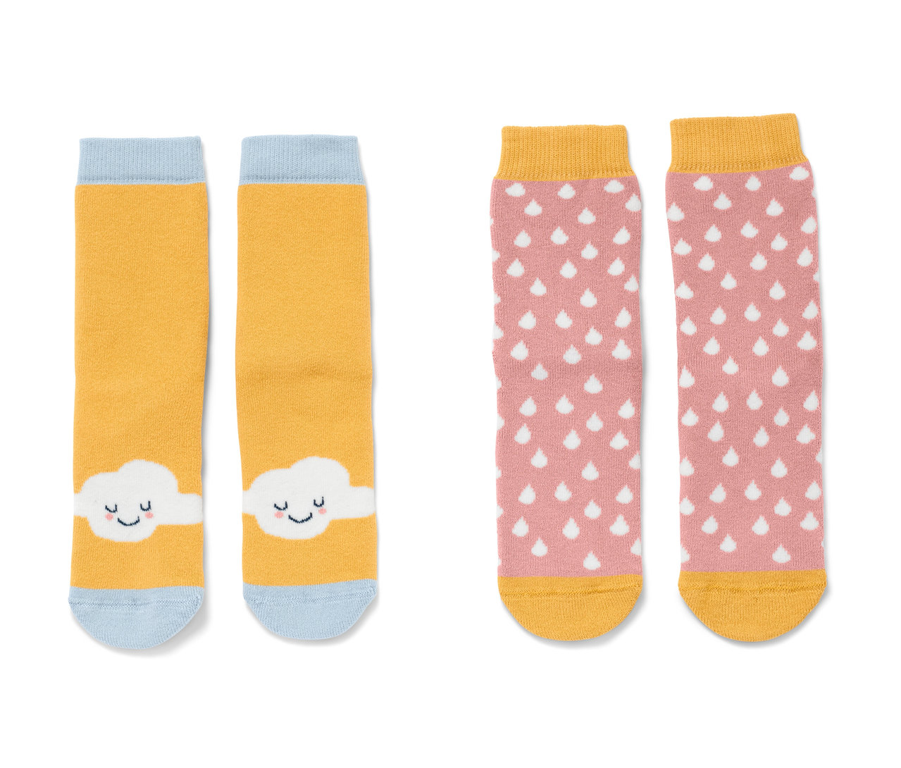 İki çift pembe küçük çocuk kaydırmaz çorap, bir sarı, mavi manşetli ve beyaz bulutlu ve bir pembe, beyaz damlalı ve sarı manşetli.