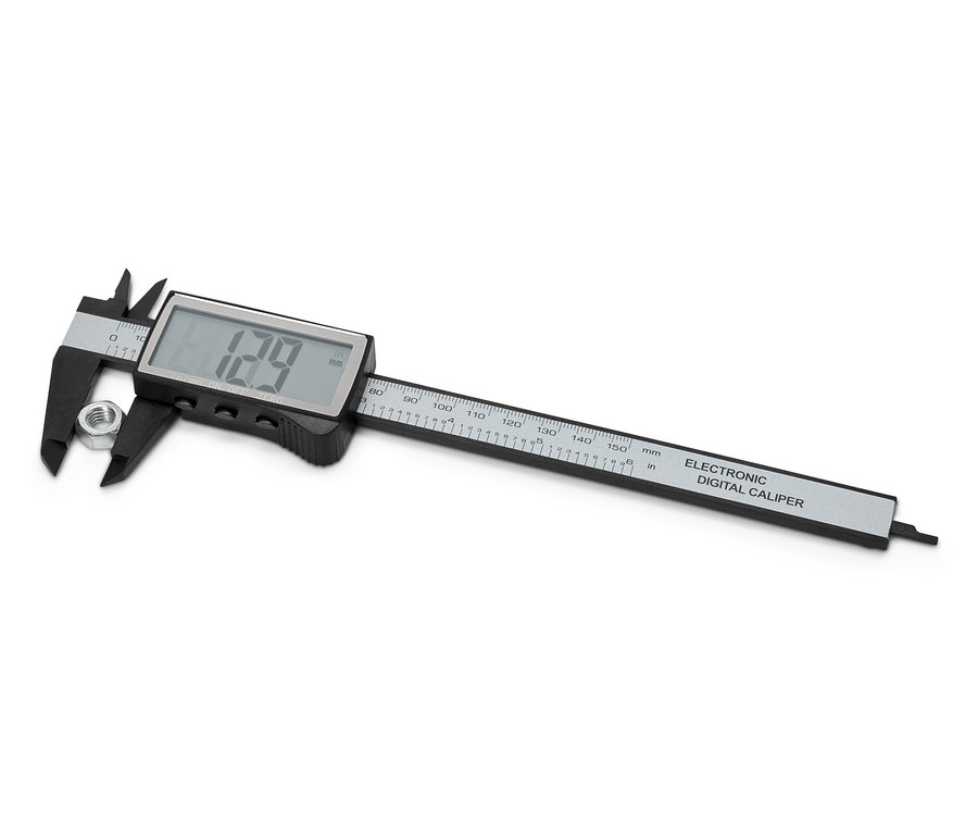 Dijital kumpas bir somunu ölçüyor.