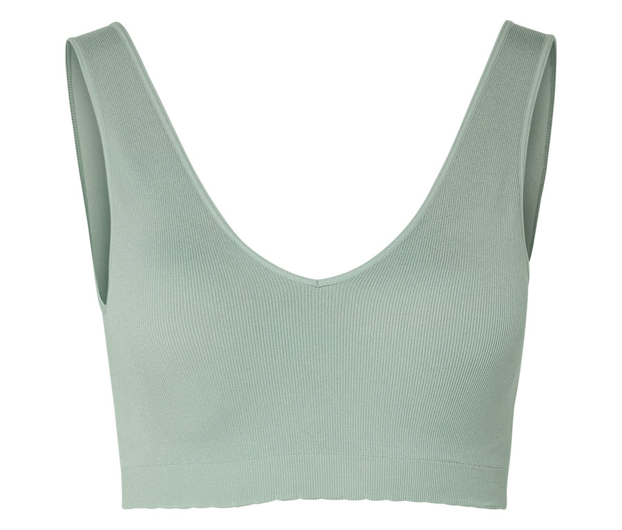 Mint yeşili, V yakalı bir spor sütyeninin yakın çekimi.