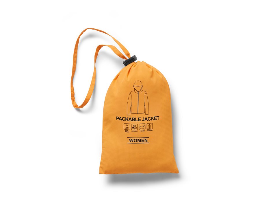 Turuncu büzgülü kese üzerinde ceket ikonu ve Katlanabilir Fonksiyonel Mont yazısı bulunur.