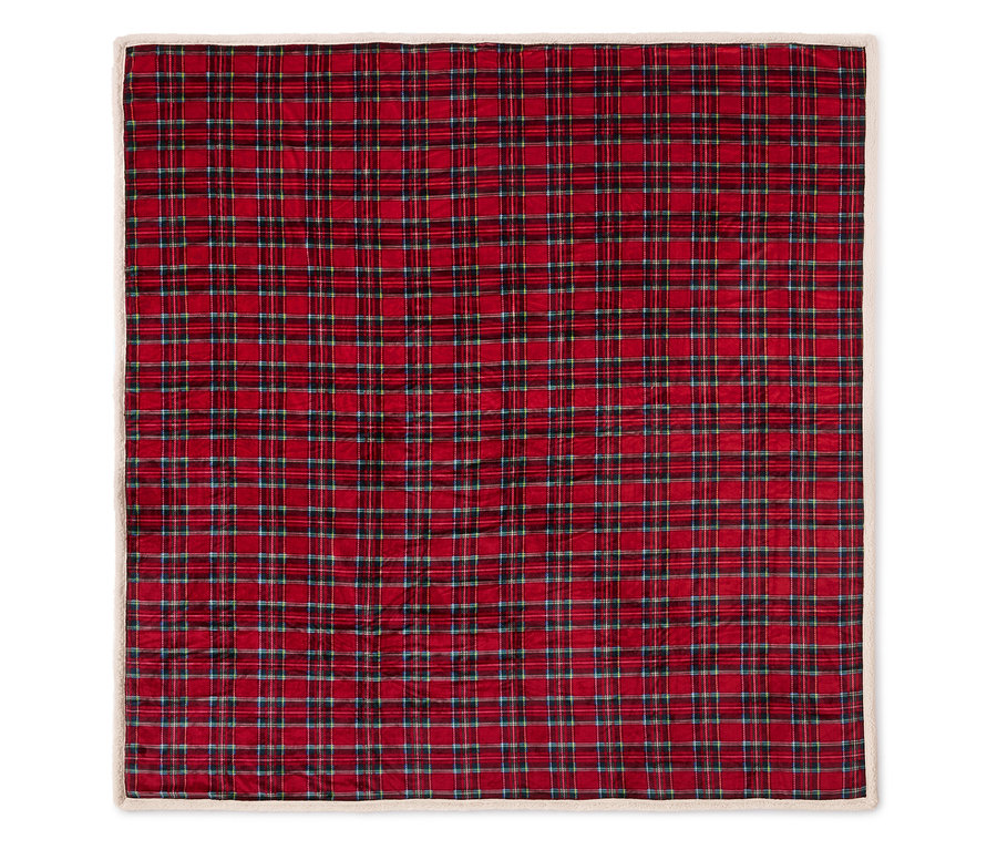 Beyaz kenarlı, kırmızı kareli battaniye.