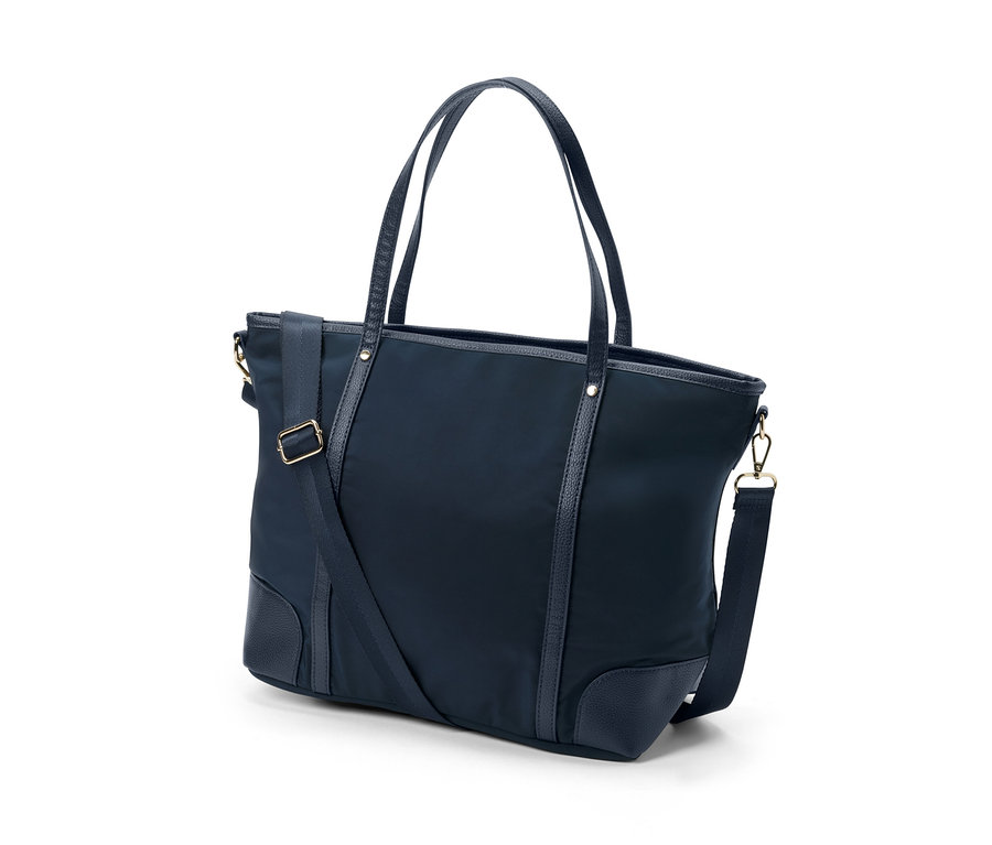 Sapları ve omuz askısı olan lacivert bir Alışveriş Çantası.