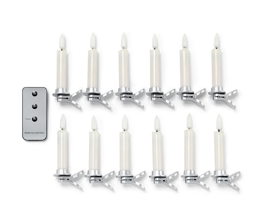 Beyaz bir arka planda 12 adet krem rengi LED yılbaşı ağacı mumu ve bir uzaktan kumanda bulunmaktadır.