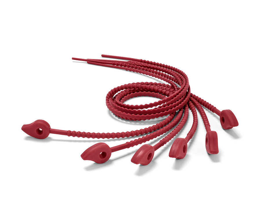 Altı adet kırmızı silikon şerit dairesel şekilde kıvrılmış.