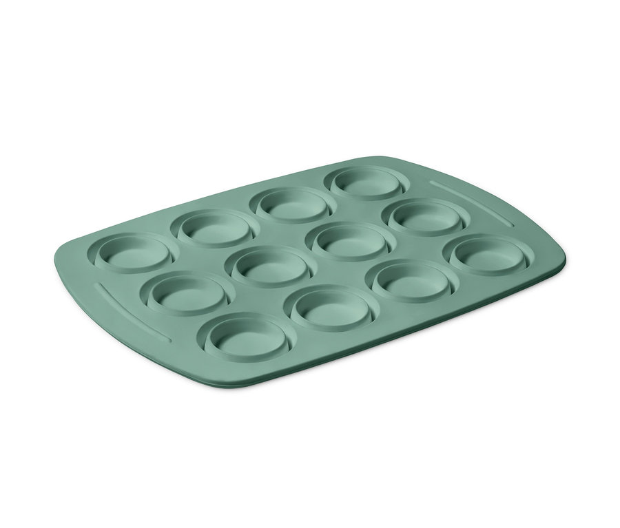 On iki yuvalı yeşil silikon muffin kalıbı.