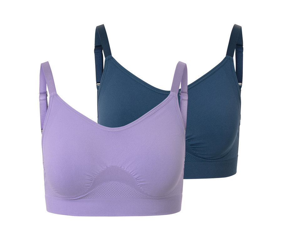 Mavi ve leylak renginde iki adet dikişsiz spor sütyen.