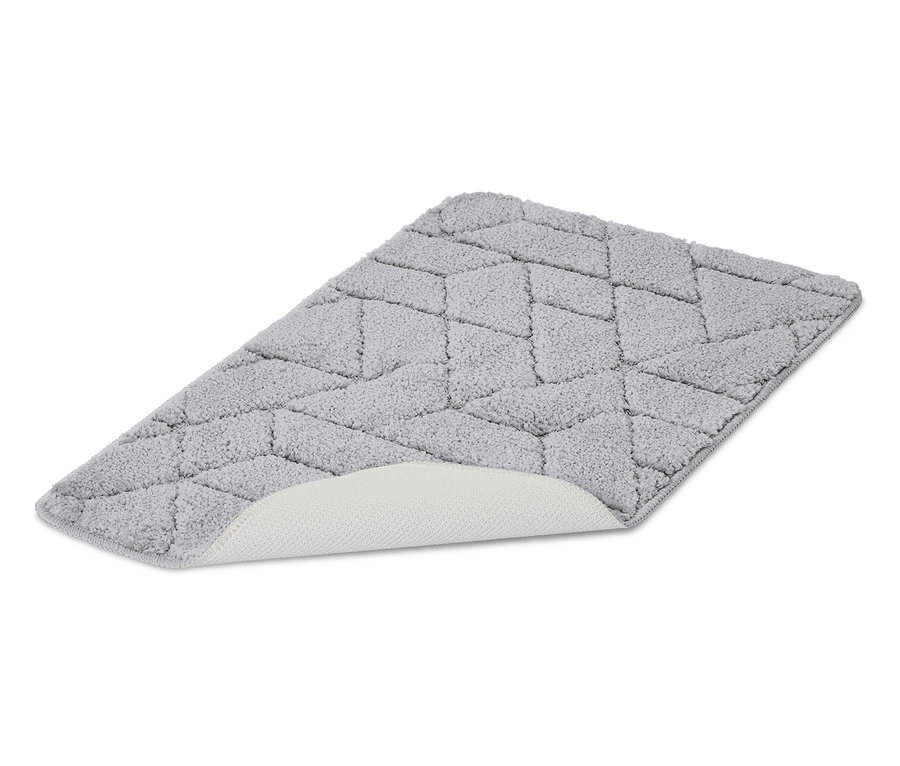 Geometrik desenli, kaymaz tabanlı gri banyo halısı.