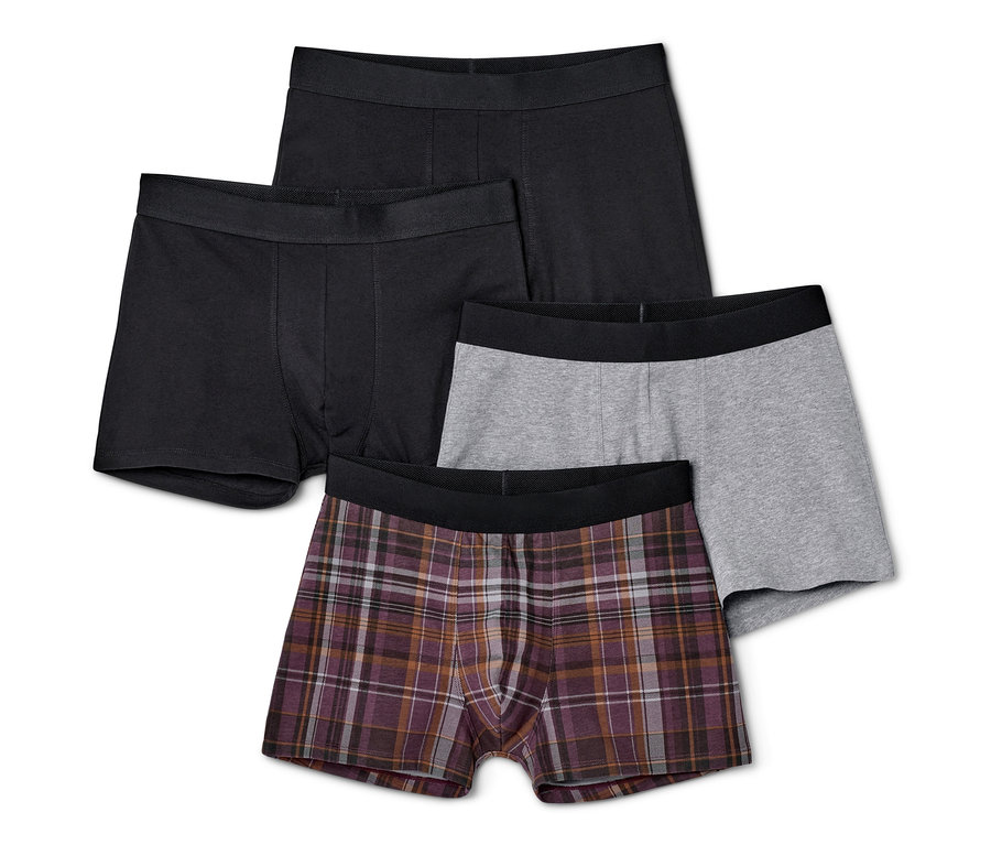 Dört adet slip boxer: iki siyah, bir gri ve bir ekose.