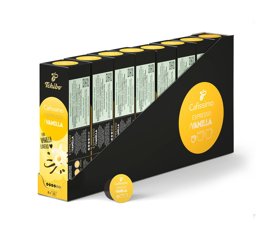 Siyah bir tutucuda birkaç paket Cafissimo Flavoured Espresso - Vanilya - 80 kapsül.