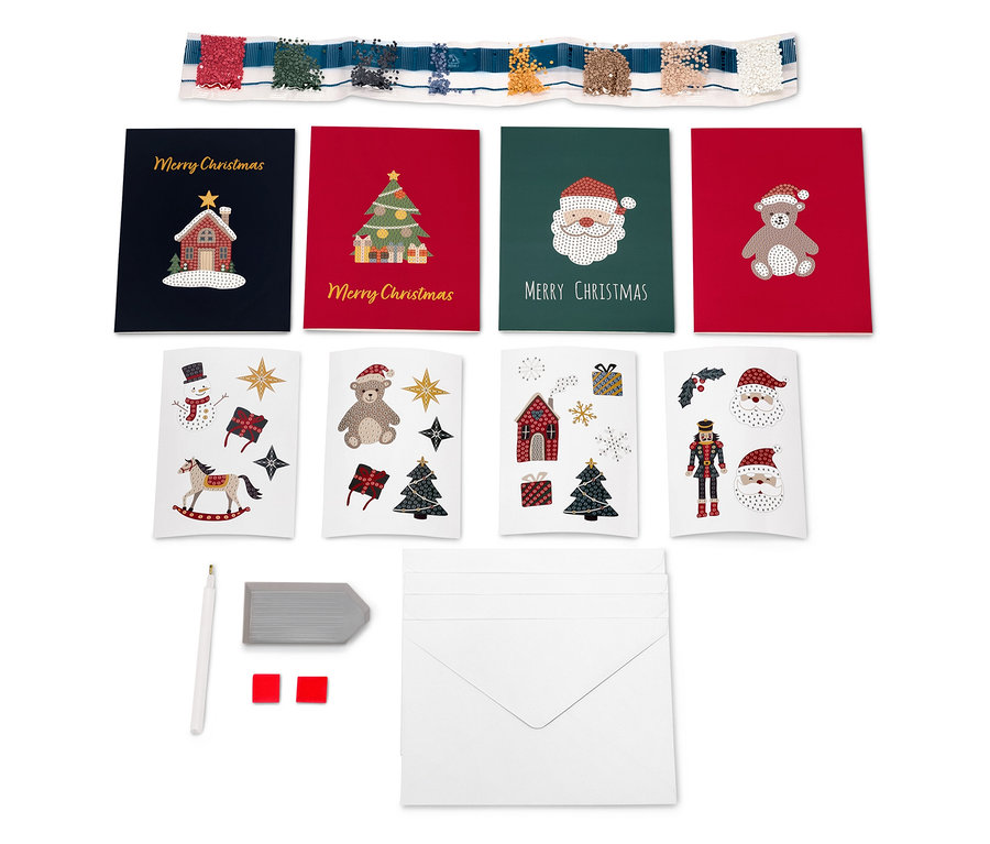 Zarflı, kalemli ve silgili Noel kartları seti.