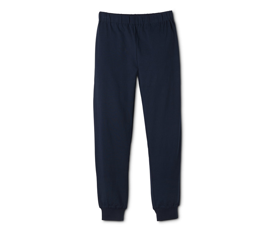 Beyaz bir arka plan üzerinde lacivert bir pijama altı.