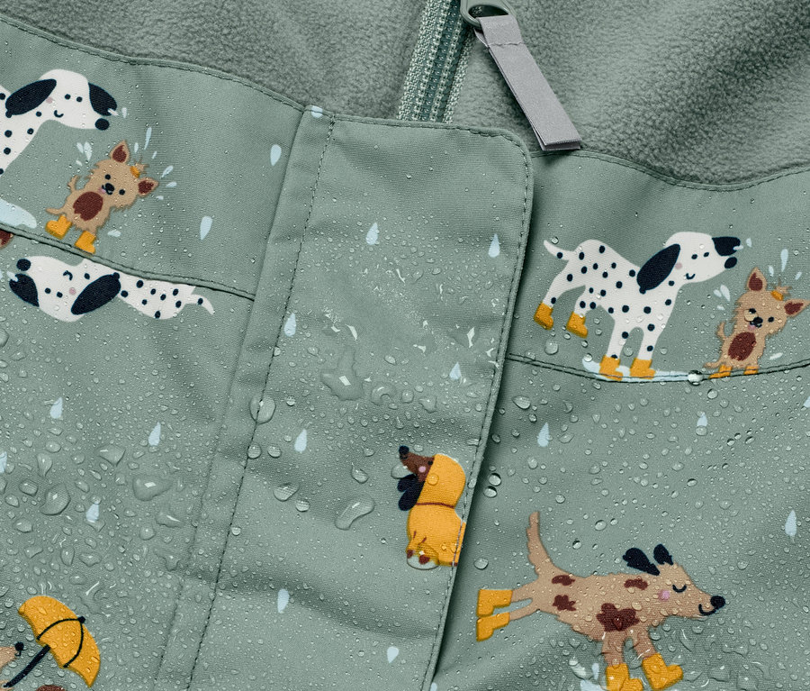 Köpek ve yağmur damlası desenli çocuk termal yağmur pantolonu detayı.