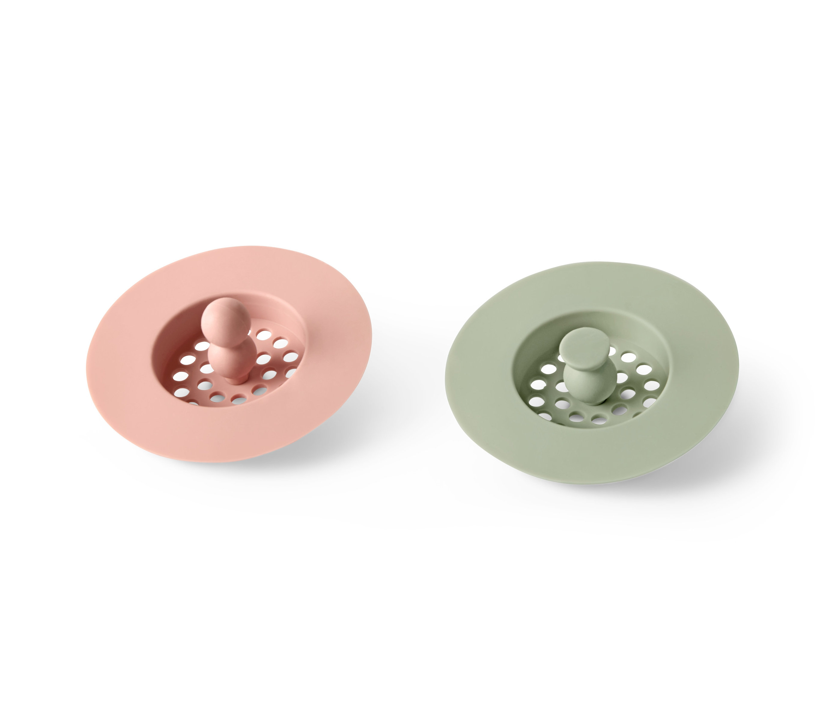 İki adet gider süzgeci: biri pembe, diğeri yeşil.