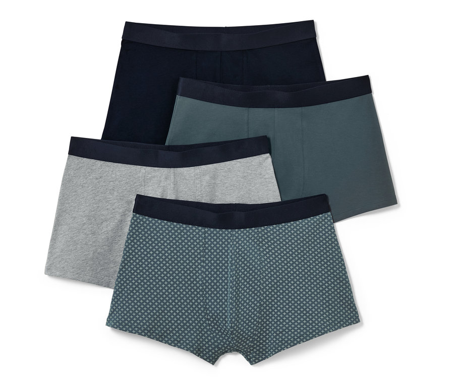 Dört adet slip boxer: biri lacivert, biri yeşil, biri gri ve biri desenli mavi-yeşil.