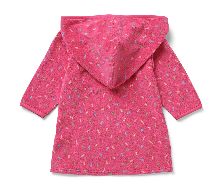 Pembe çocuk havlu panço, kapüşonlu ve renkli sprinkles baskılı.