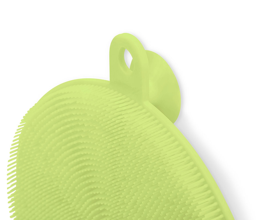 Açık yeşil bir silikon bulaşık süngerinin yakın çekimi.