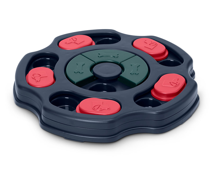 Döner mekanizmalı, kırmızı kapaklı ve yeşil kemikli interaktif köpek oyuncağı.