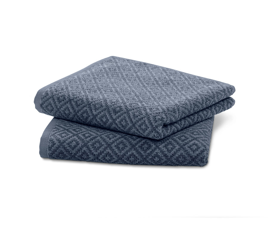 İki adet jakarlı el havlusu üst üste katlanmış.