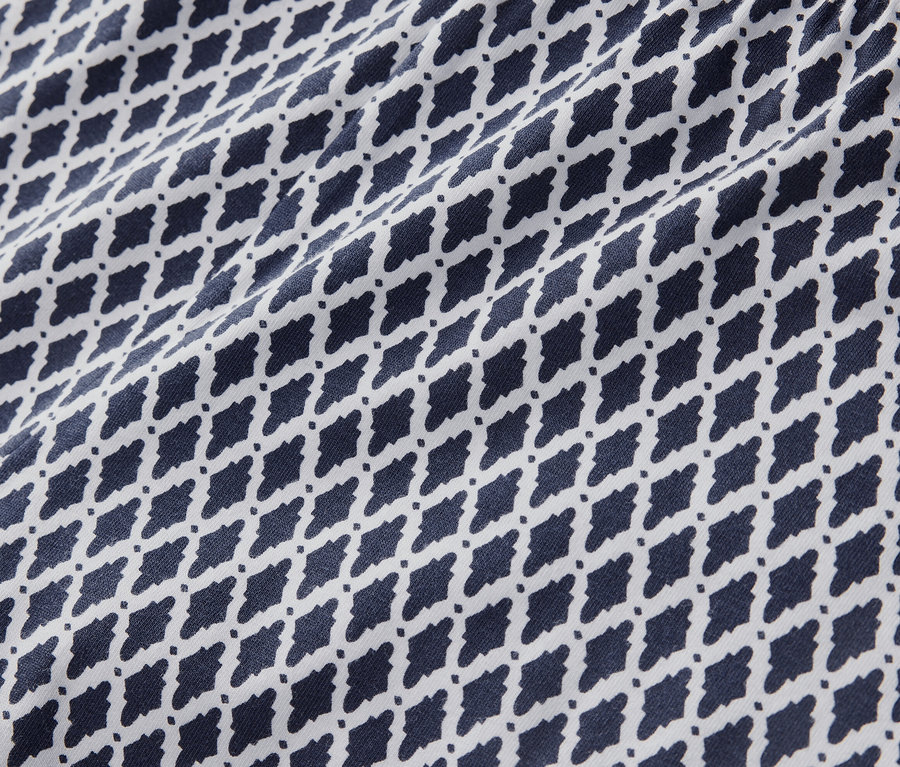 Baskılı 3/4 taytın yakın çekimi.