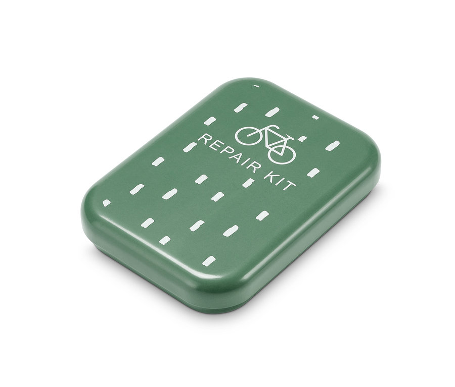 Beyaz baskılı yeşil bisiklet tamir seti.