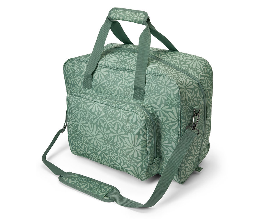 Çiçek desenli yeşil dikiş makinesi çantası.