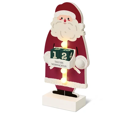 Advent takvimi olan ahşap Noel Baba figürü.