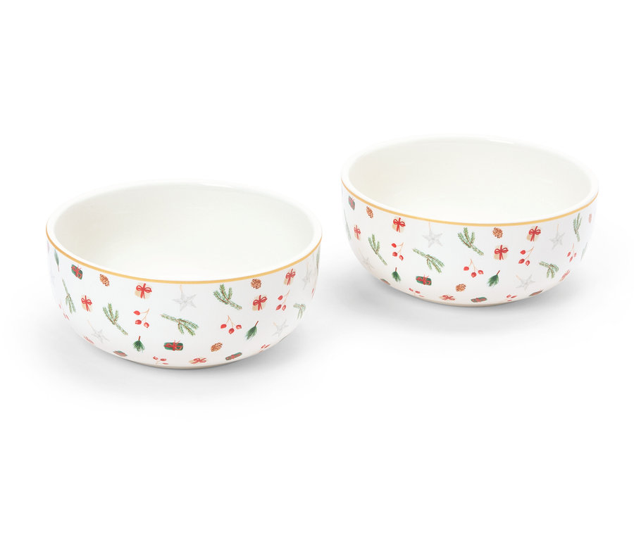 Beyaz bir arka planda Noel desenli iki kase duruyor.