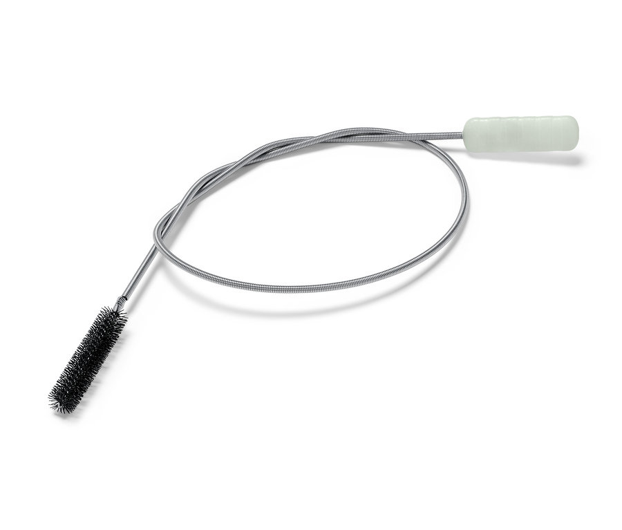 Beyaz arka planda esnek bir gider fırçası.