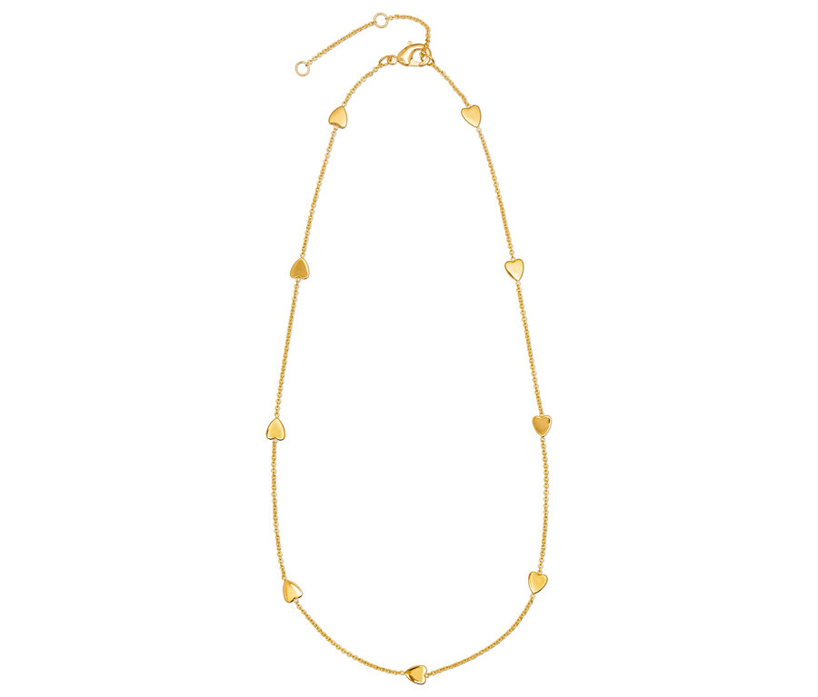 Kalp şeklinde kolye uçları olan altın kolye.