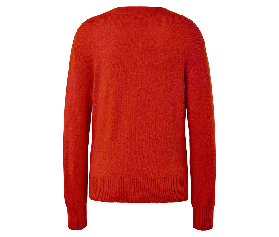 Uzun kollu turuncu bir kazağın arka görünümü.