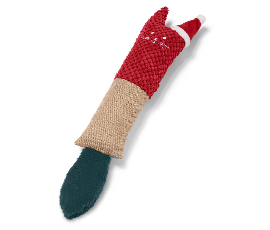 Noel şapkalı ve yeşil kuyruklu kedi şeklinde kırmızı kedi oyuncağı.