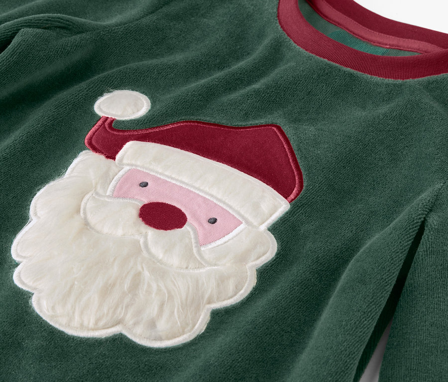 Noel Baba aplikeli yeşil Noel kazağı.